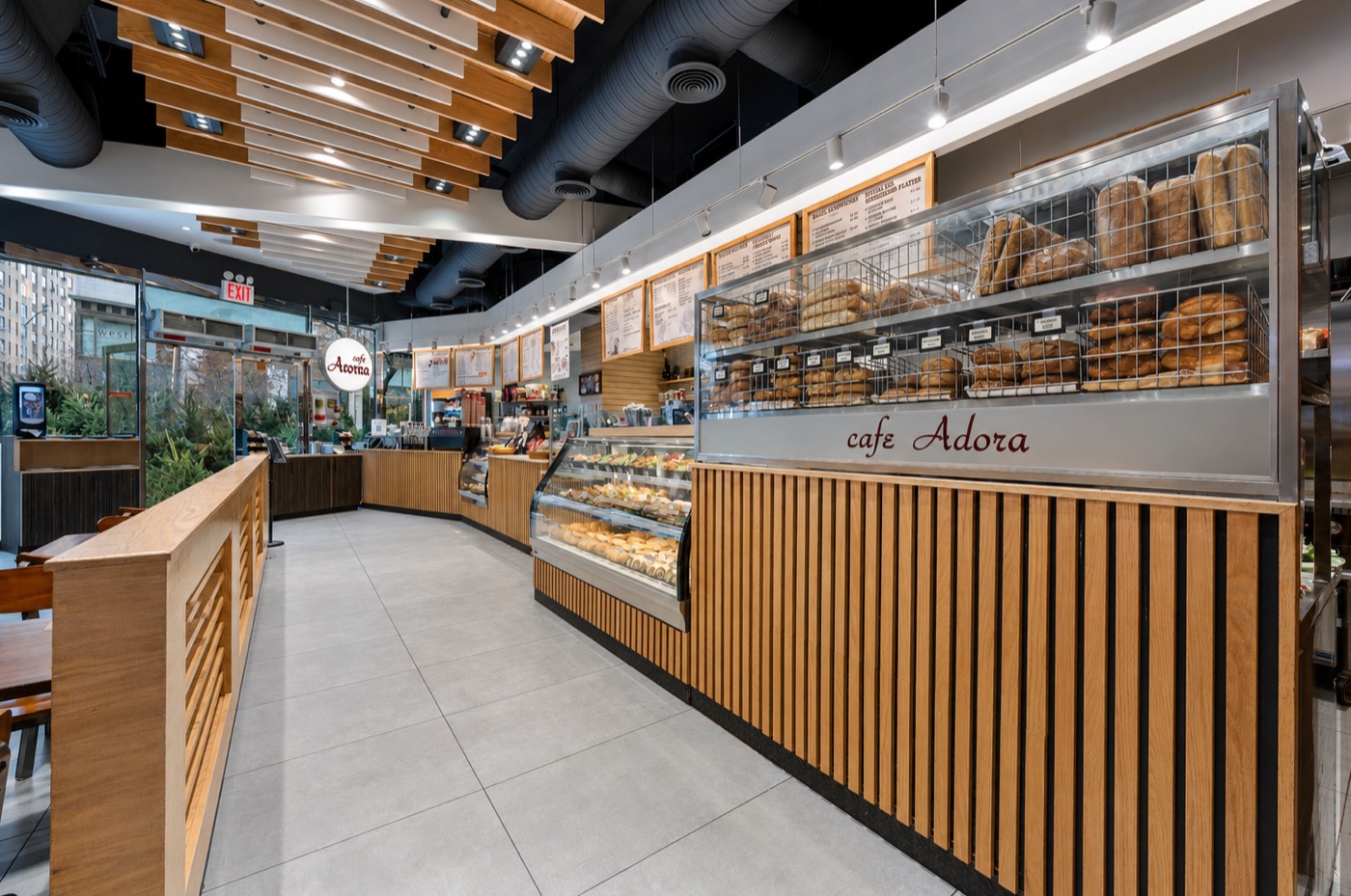 Cafe Adora Columbus Circle bakery counter and fresh bagels